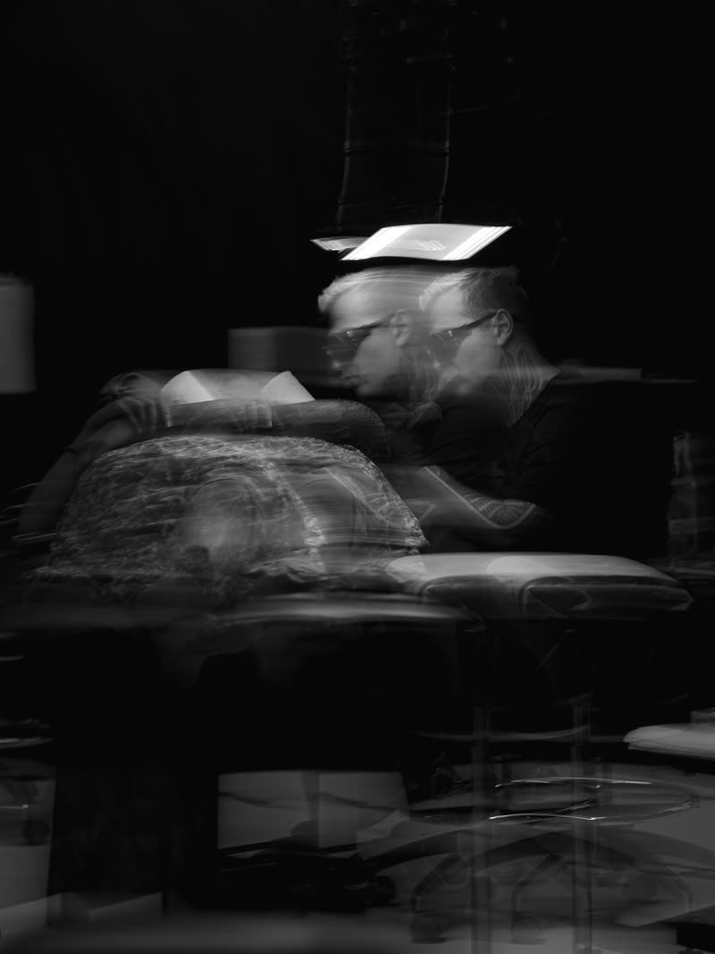 Long exposure of the booth, the artist smeared into the room